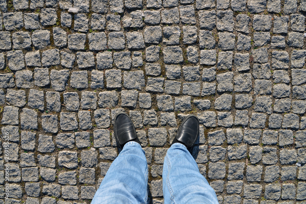 Old cobblestone pavement close-up. Old cobblestone pavement close-up.
