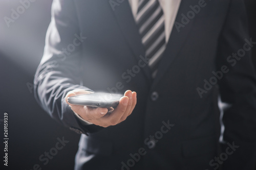 Business Man using Mobile Phone