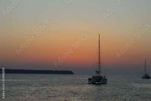 sailboat at sunset © vanessa