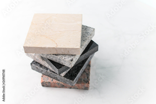 assorted marble and granite floor tiles