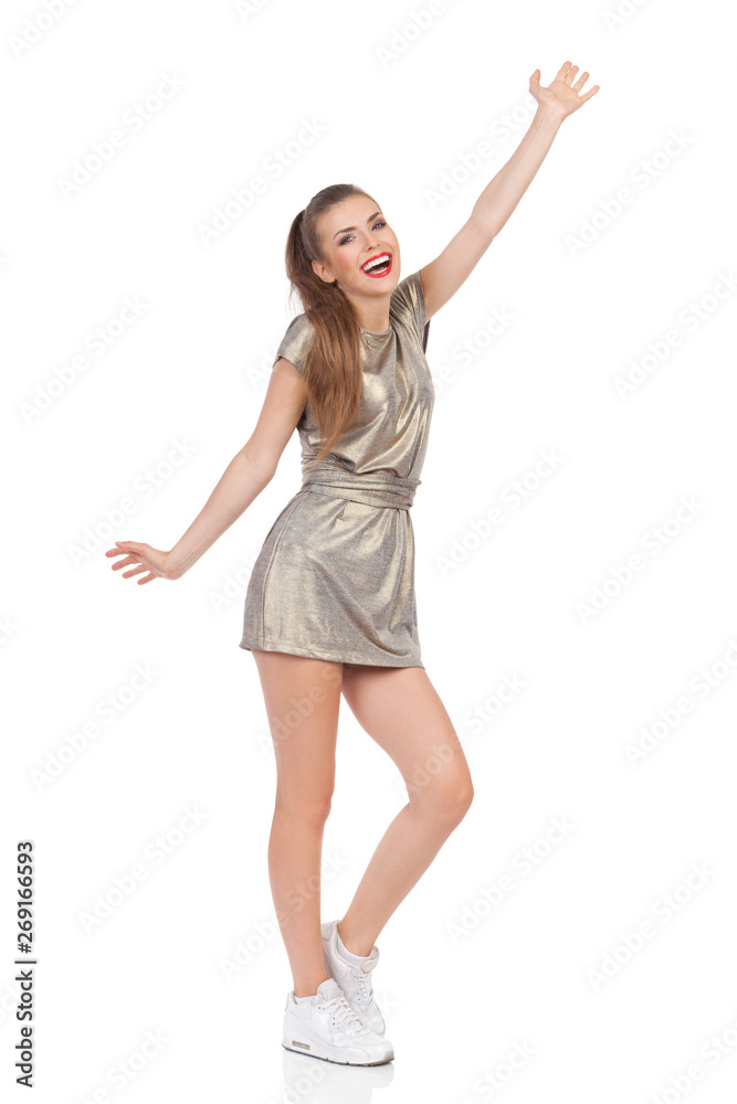Happy Young Woman Is Laughing With Arms Outstretched Happy Young Woman Is Laughing With Arms Outstretched