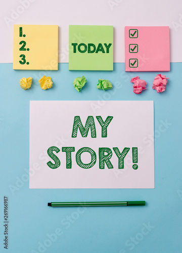 Writing note showing My Story. Business concept for your past life events actions or choices you made Note papers and stationary placed sideways on top of softhued backdrop © Artur
