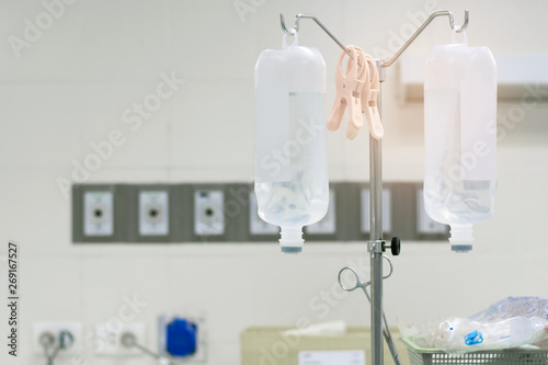 Saline IV drip for patient and Infusion pump in hospita © blindturtle