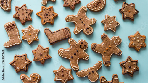 Closeup Christmas Gingerbread cookies on the blue table. Crhistmas celebration.