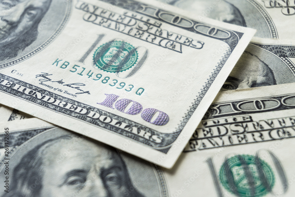 Pile of old one hundred dollar bills bills, close up dollars