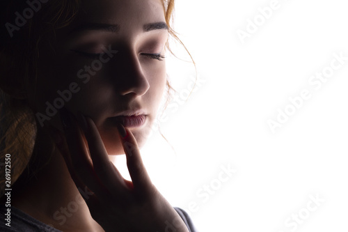 portrait of beautiful girl, woman face on white isolated background, concept of beauty and fashion photo