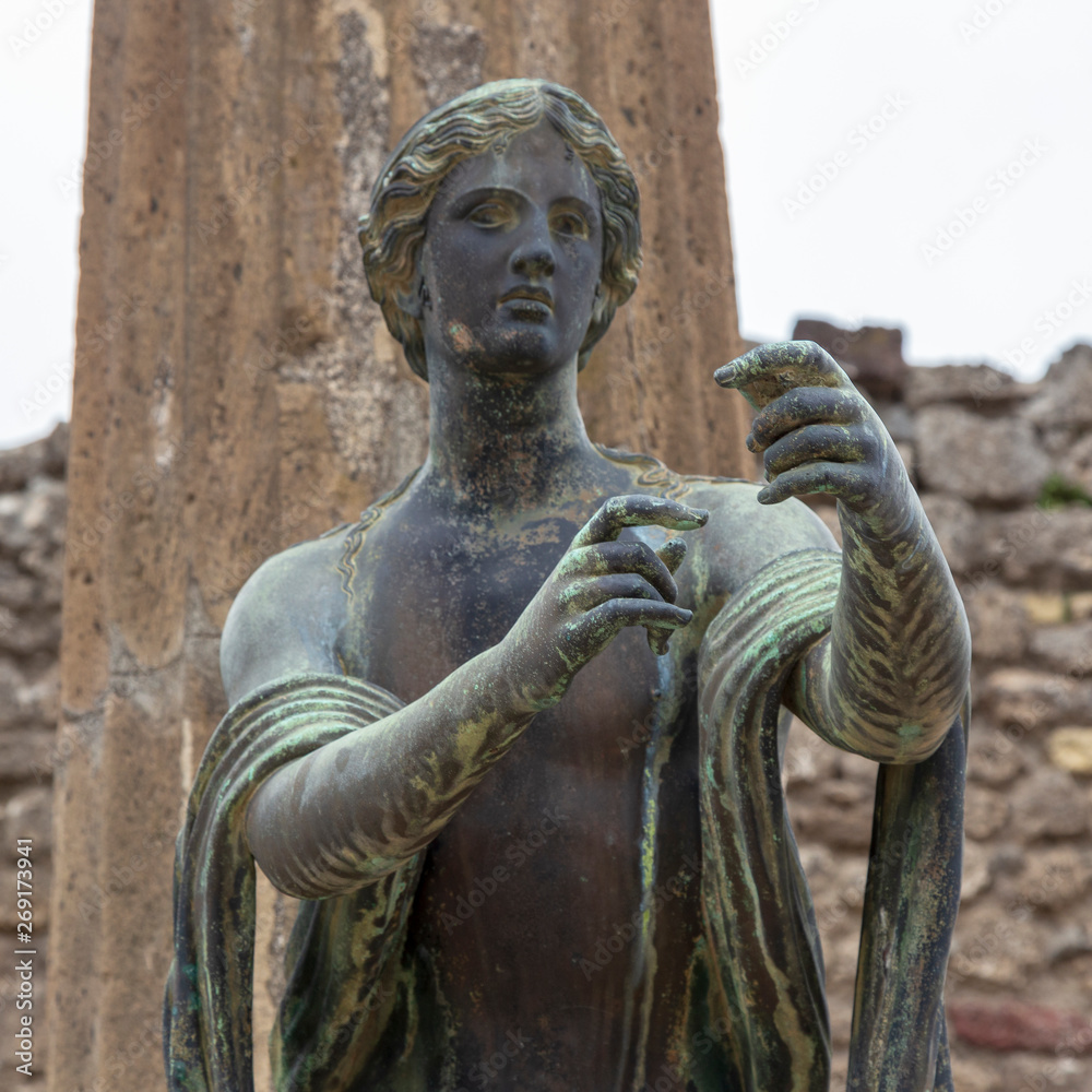 Pompeii, Italy. 04-22-2019. Statue  in antique roman house at  Pompeii, Italy.