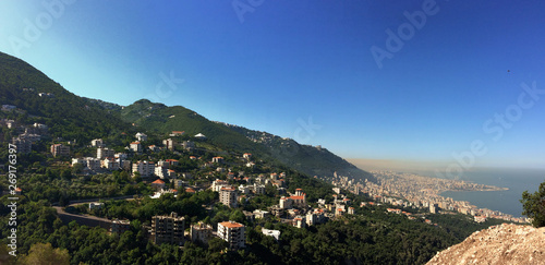 overview of Beirut, Jounieh and Mount Lebanon, in Lebanon with a dramatic cloud of atmospheric pollution  photo