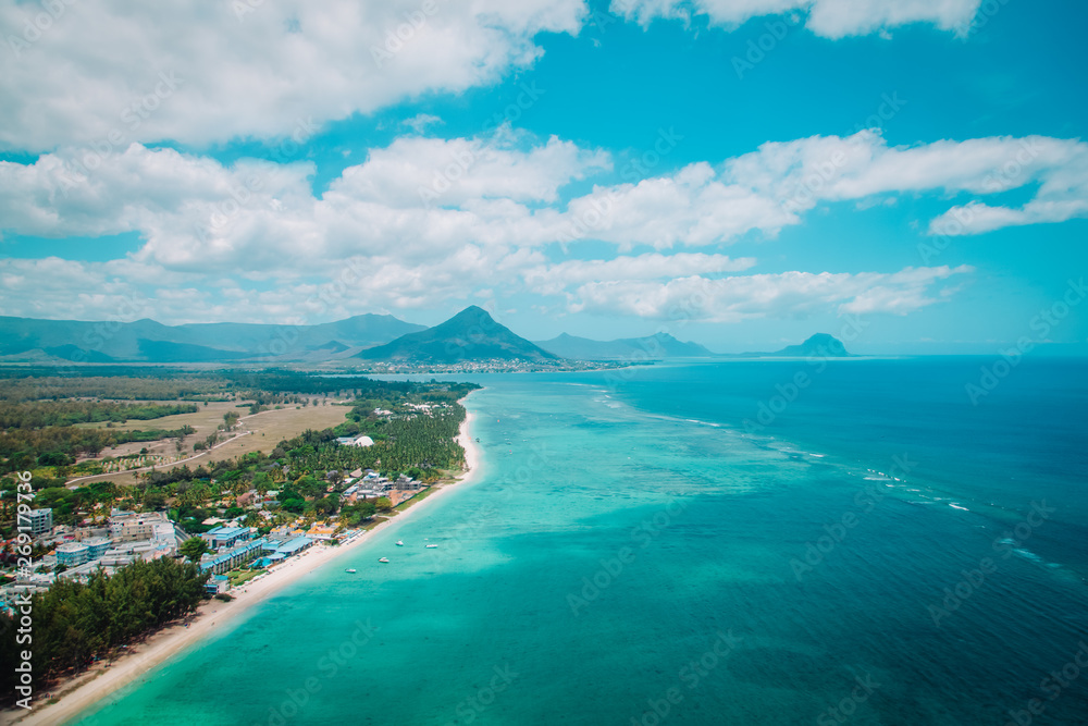 Aerial view of Mauritius with mountains on background, travel concept