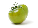 fresh green tomato isolated on white background