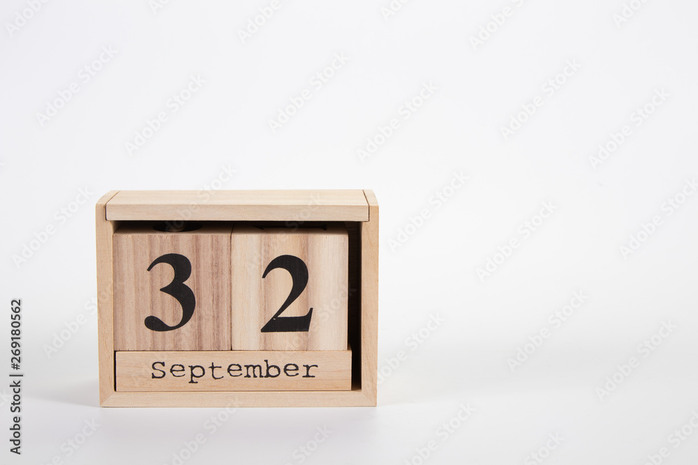 Wooden calendar September 32 on a white background Wooden calendar September 32 on a white background
