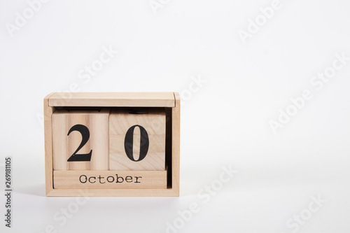 Wooden calendar October 20 on a white background