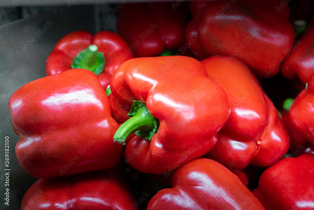 organic red bell peppers in market place organic red bell peppers in market place