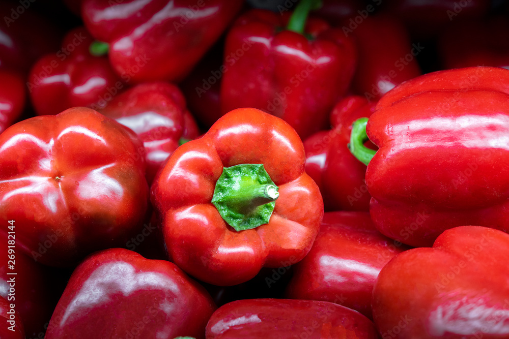 organic red bell peppers in market place organic red bell peppers in market place