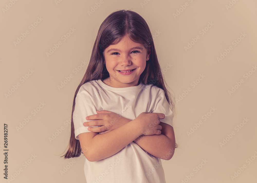 Fototapeta premium Portrait of a beautiful clever child with a happy, cheerful face looking confident. Human emotions