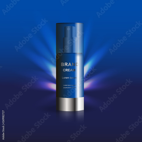 Bottle of night face cream on blue background. Template for advertising your product.
