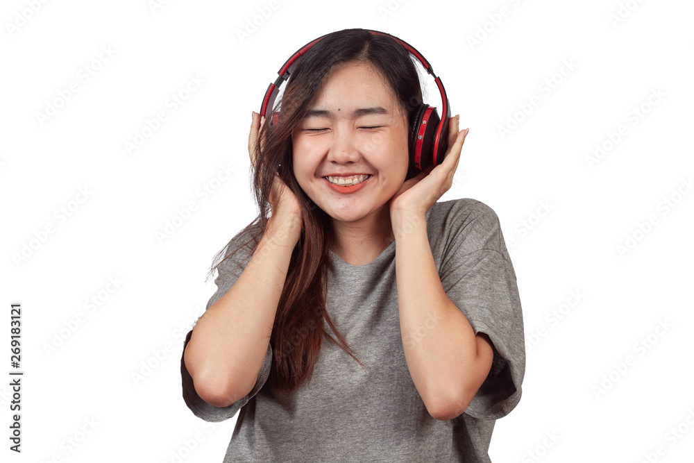 young woman wearing headset enjoying new audio tracks playing in smartphone. young woman wearing headset enjoying new audio tracks playing in smartphone.