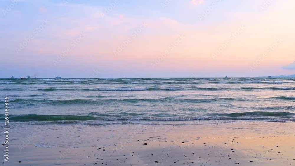 The waves hit the beach, the sea in the evening, the bitter sky The waves hit the beach, the sea in the evening, the bitter sky