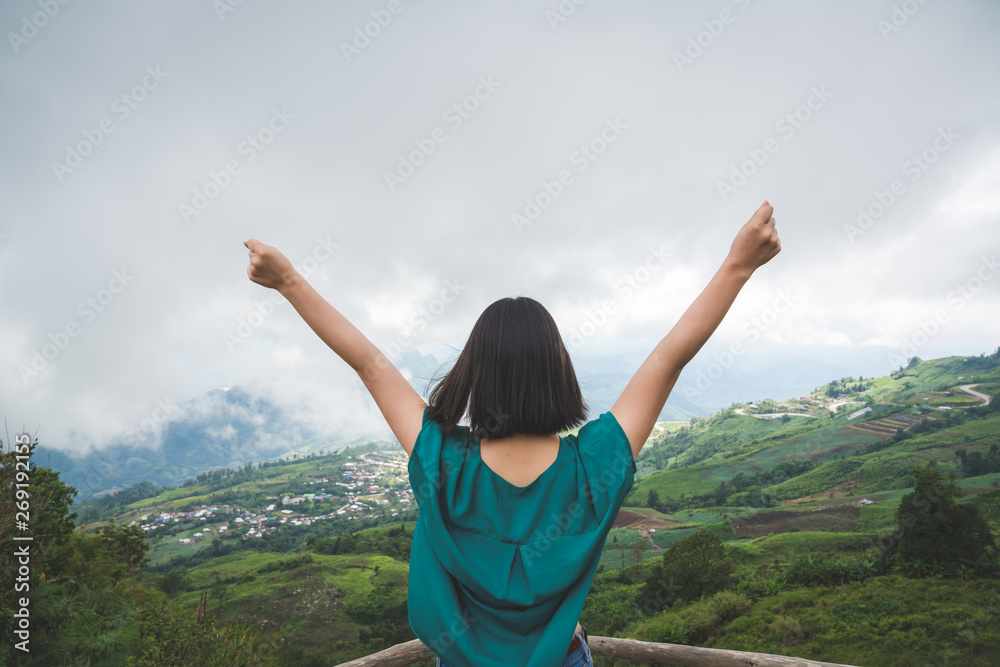 Happy young cute Asian Japanese girl hipster backpack women travelling looking at beautiful sky mountains scenery views Happy young cute Asian Japanese girl hipster backpack women travelling looking at beautiful sky mountains scenery views