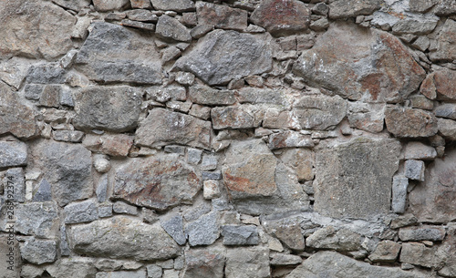 medieval texture of field stones of a fortress wall