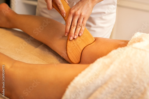 Anti-cellulite Madero Therapy massage done with specially designed wooden tool