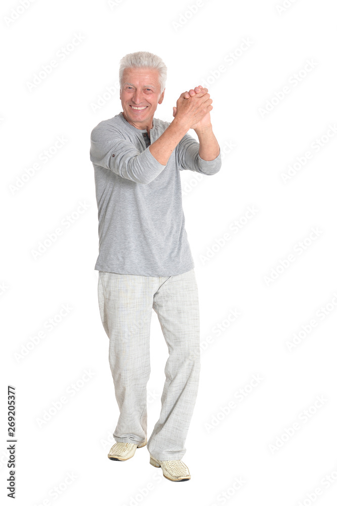 Successful senior man in casual clothing posing on white background Successful senior man in casual clothing posing on white background