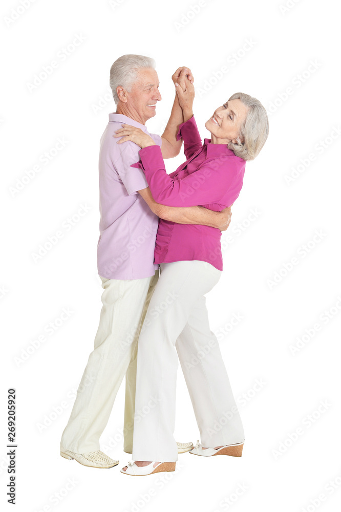 Portrait of senior couple dancing on white background Portrait of senior couple dancing on white background