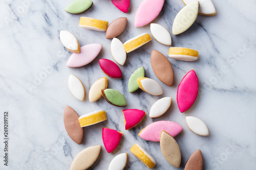 Calissons assortment on marble background. Traditional French Provence sweets. Top view.