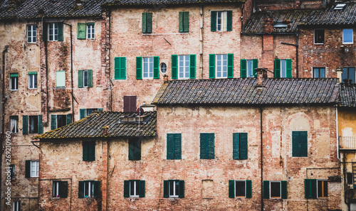 Crowd of ancient houses. Siena, Tuscany, Italy.