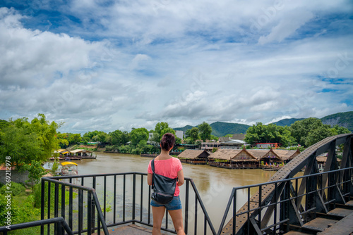 Happy young girl hipster backpack women travelling looking at beautiful sky mountains scenery views 