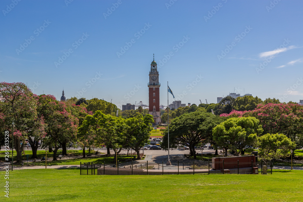 Torre Monumental a clock tower located in the district of Retiro in the Plaza Británica next to the Calle San Martín, bright day light blue sky, Buenos Aires, Argentina.