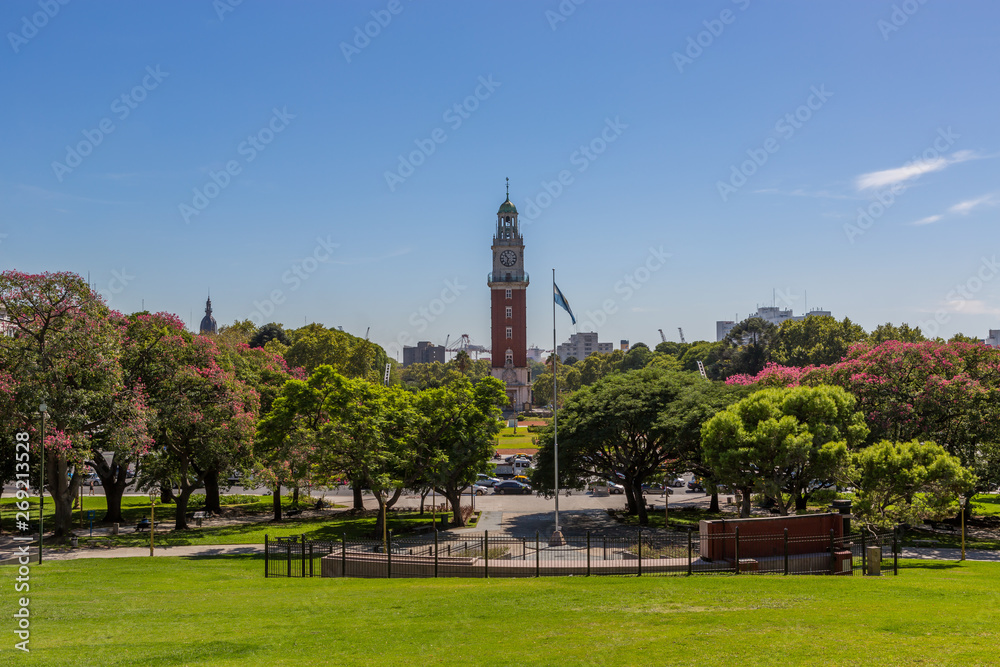 Obraz premium Torre Monumental a clock tower located in the district of Retiro in the Plaza Británica next to the Calle San Martín, bright day light blue sky, Buenos Aires, Argentina.