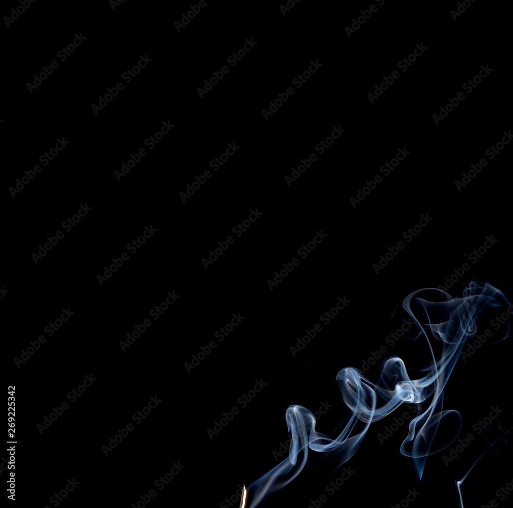 Abstract smoke of joss stickon black background