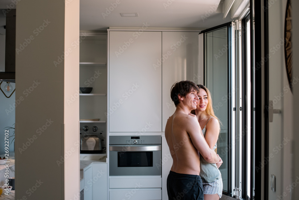 Couple having breakfast at home