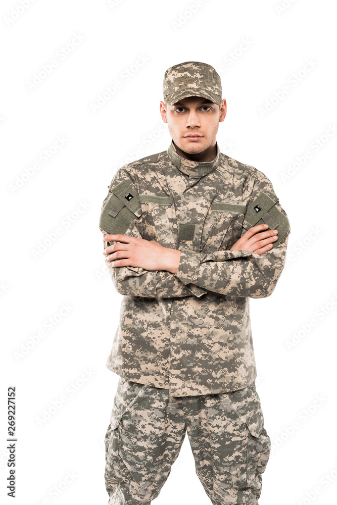 handsome soldier in uniform standing with crossed arms isolated on white handsome soldier in uniform standing with crossed arms isolated on white