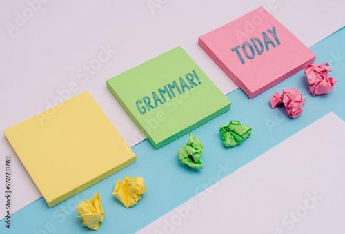 Word writing text Grammar. Business photo showcasing whole system structure language syntax and morphology Note papers and stationary placed sideways on top of softhued backdrop