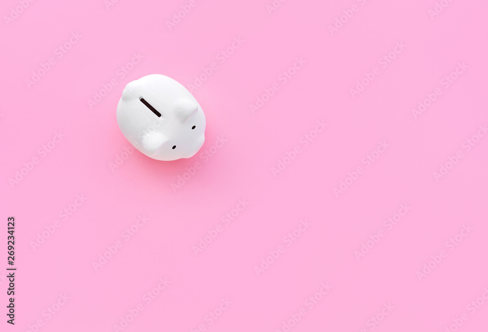 Piggy bank on pink pastel color background.money and financial concepts