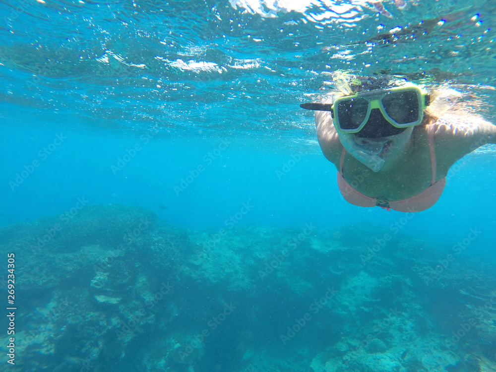 Snorkeling over Great Barrier Reef in Australia. Dive stock photo