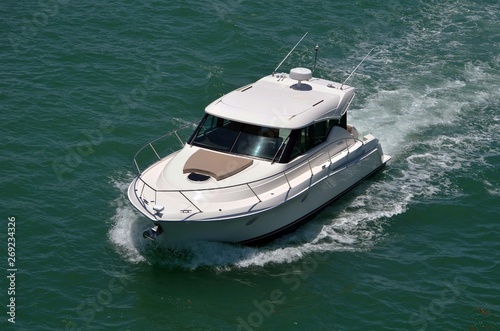 well appointed cabin cruiser on the Florida Intra-Coastal Waterway off Miami Beach. © Wimbledon