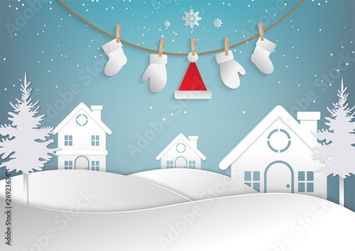 Merry Christmas and Happy New Year, Hang winter clothes. Santa stocking cap glove on the sky.vector icon paper art style.