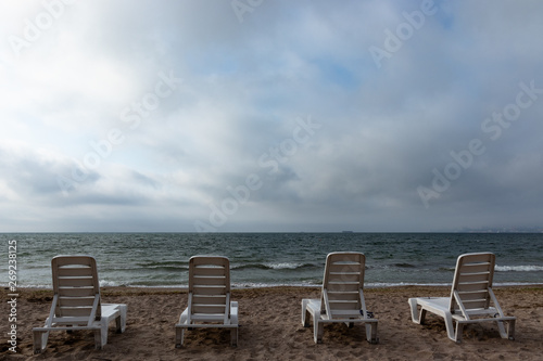 two chairs on the beach © Spyrydon