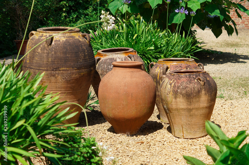 empty Spanish flower pots in patio empty Spanish flower pots in patio
