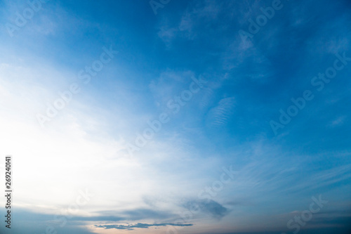 Beautiful blue sky with cloud and small orange color in the lower part for nature background.