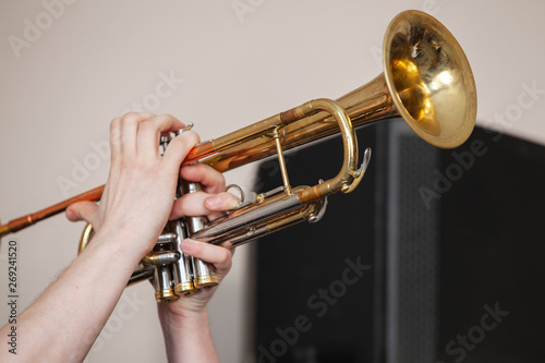 Trumpet in trumpeter hands