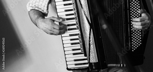 Accordionist plays vintage accordion