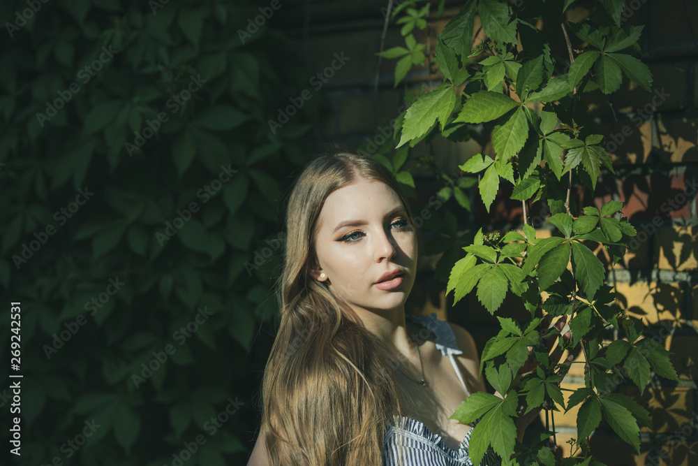 portrait of young woman in spring garden portrait of young woman in spring garden
