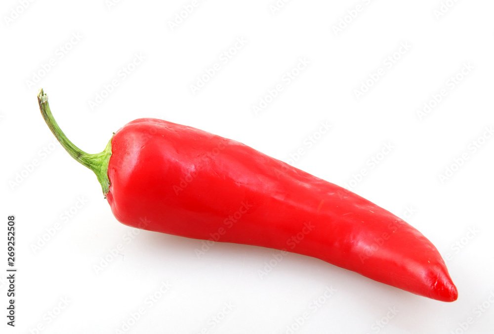 Close-Up Of Red Chili Pepper Against White Background