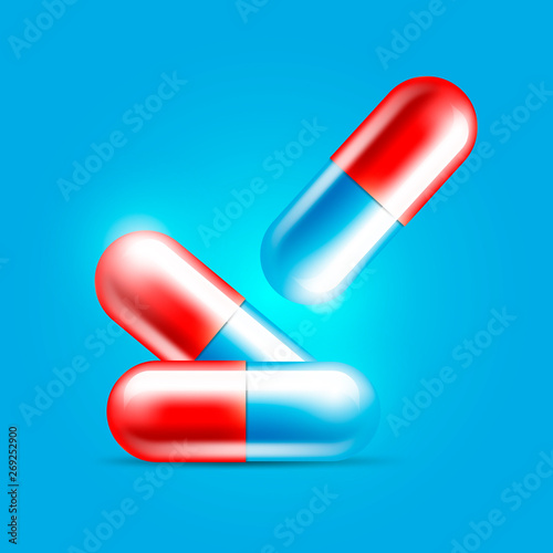 Medical pills set on a blue background