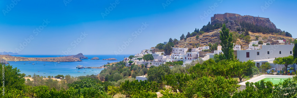 Greece trip in summer, panorama of Lindos city of Rhodes island, beautiful architecture of the city.