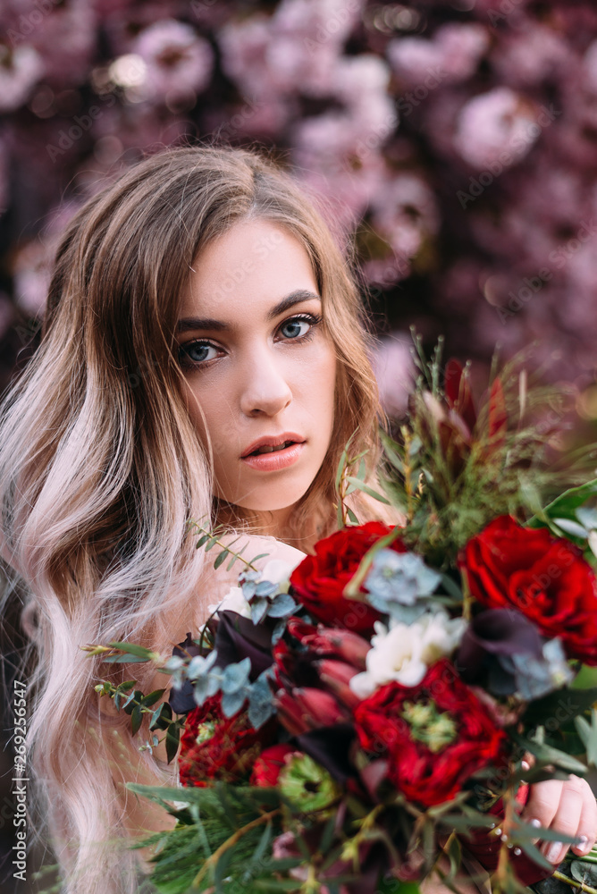 portrait of a stylish bride close up beautiful wedding bouquet portrait of a stylish bride close up beautiful wedding bouquet